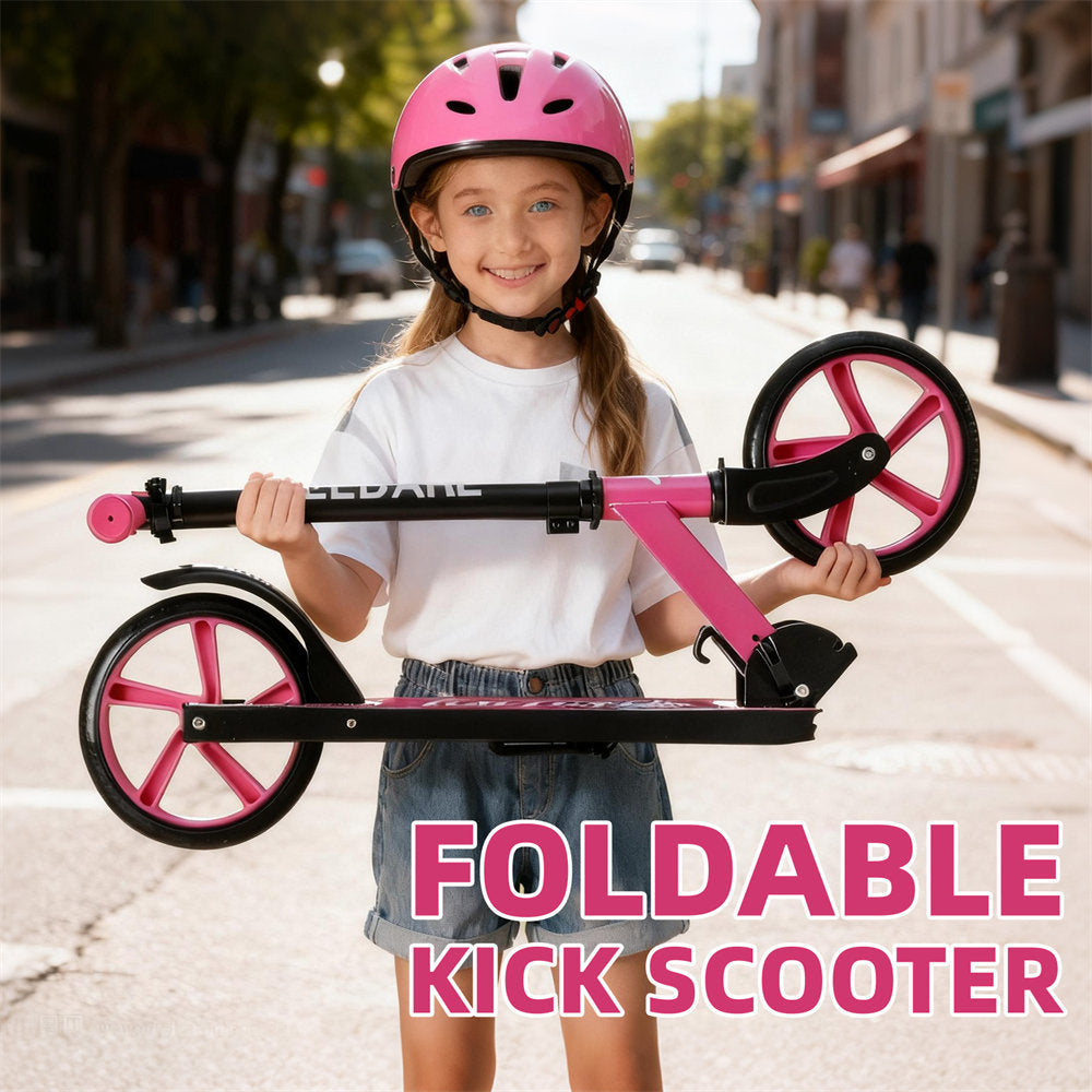 Child holding a foldable kick scooter with pink wheels on a city street.